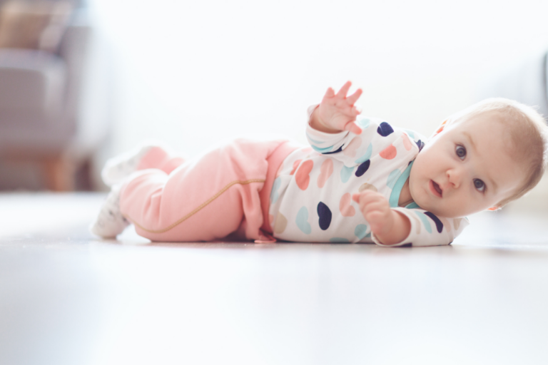 what age do babies start rolling over