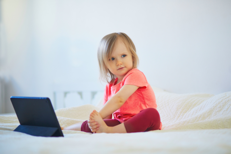 toddler with tablet
